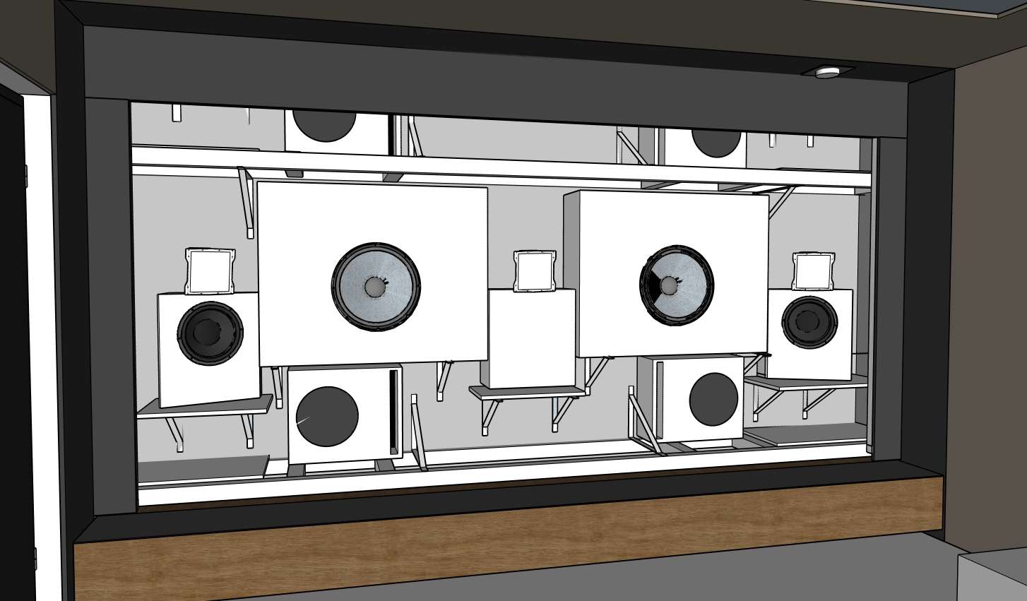 Blick hinter die Leinwand: Baffle Wall mit Lautsprecher- und Subwoofer-Kammern